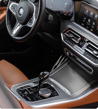 Cleaned car interior showing steering wheel and centre console.